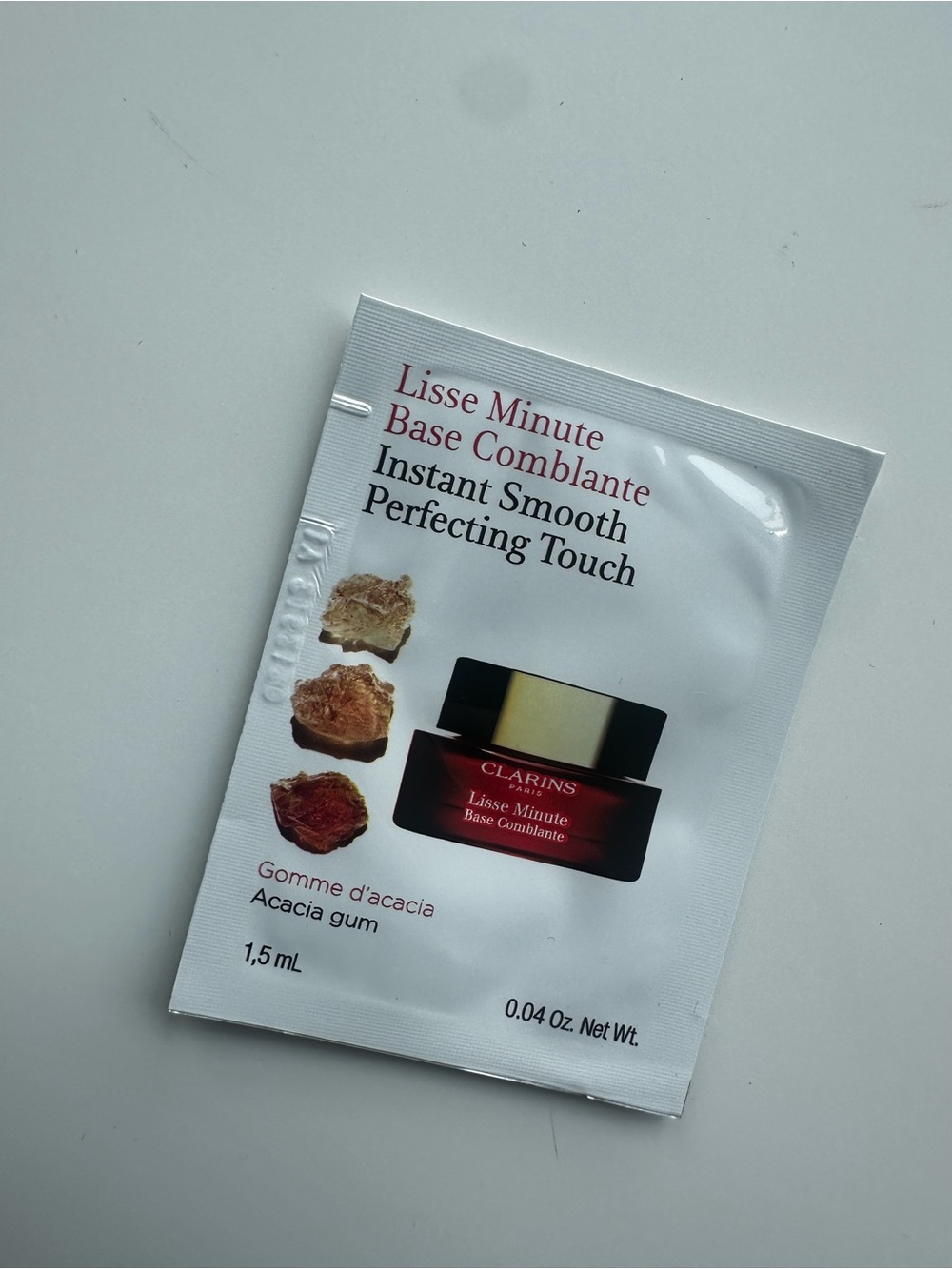 Clarins Instant Smooth Perfecting Touch Sachet - White & Red & Black & Gold